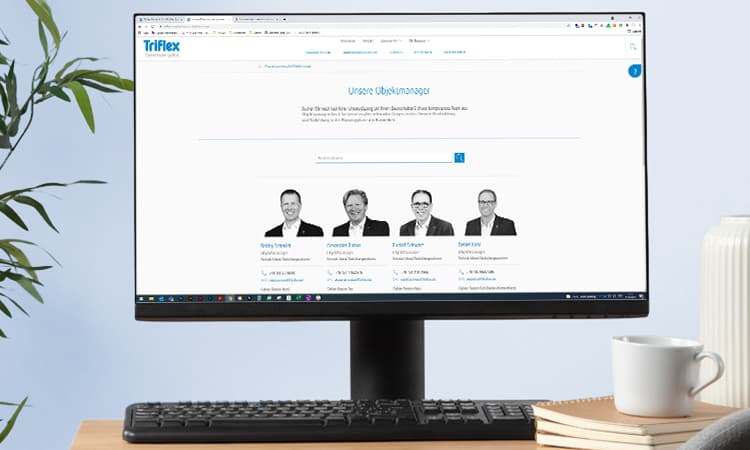 Desktop monitor with a website for finding contacts in the construction industry