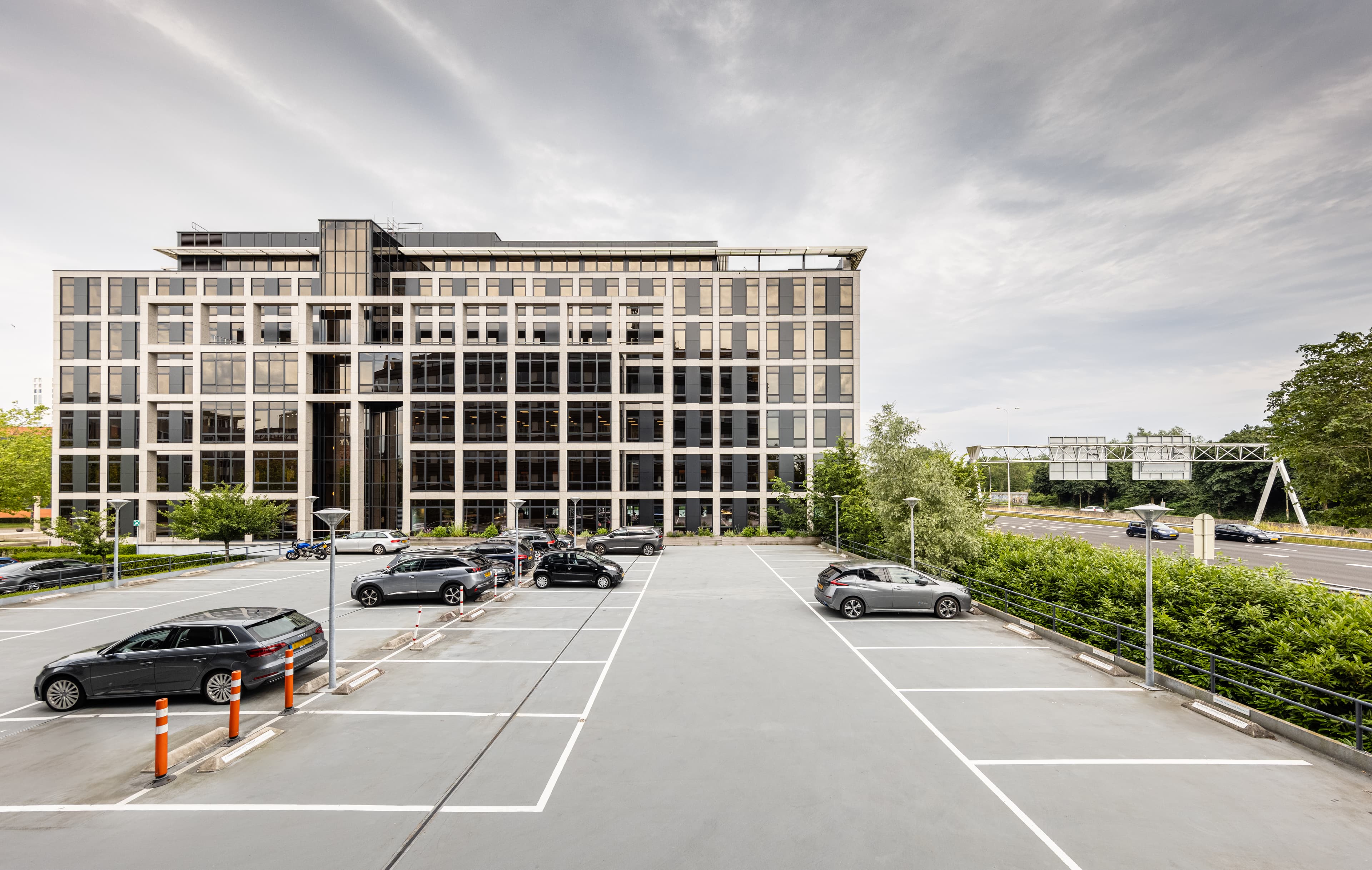 Buildings with adjacent transportation and functional areas in an urban setting