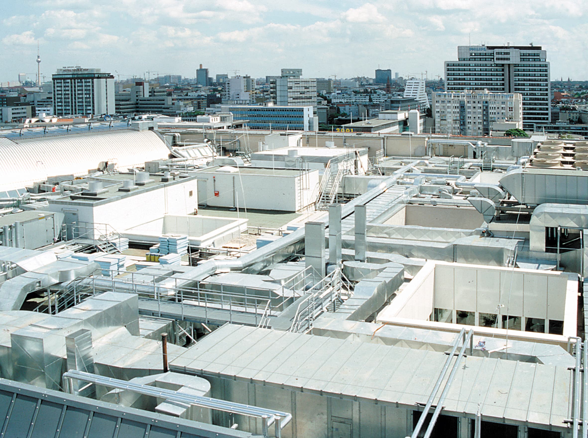 Industrial roof with numerous technical structures, penetrations, and connections